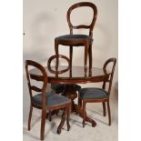 An Italian rococo mahogany and marquetry inlaid pedestal dining chairs raised on bulbous carved