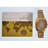 A vintage Omega Megaquartz 32KH2 Geneve wrist watch having a gilt strap with a square face, gilt