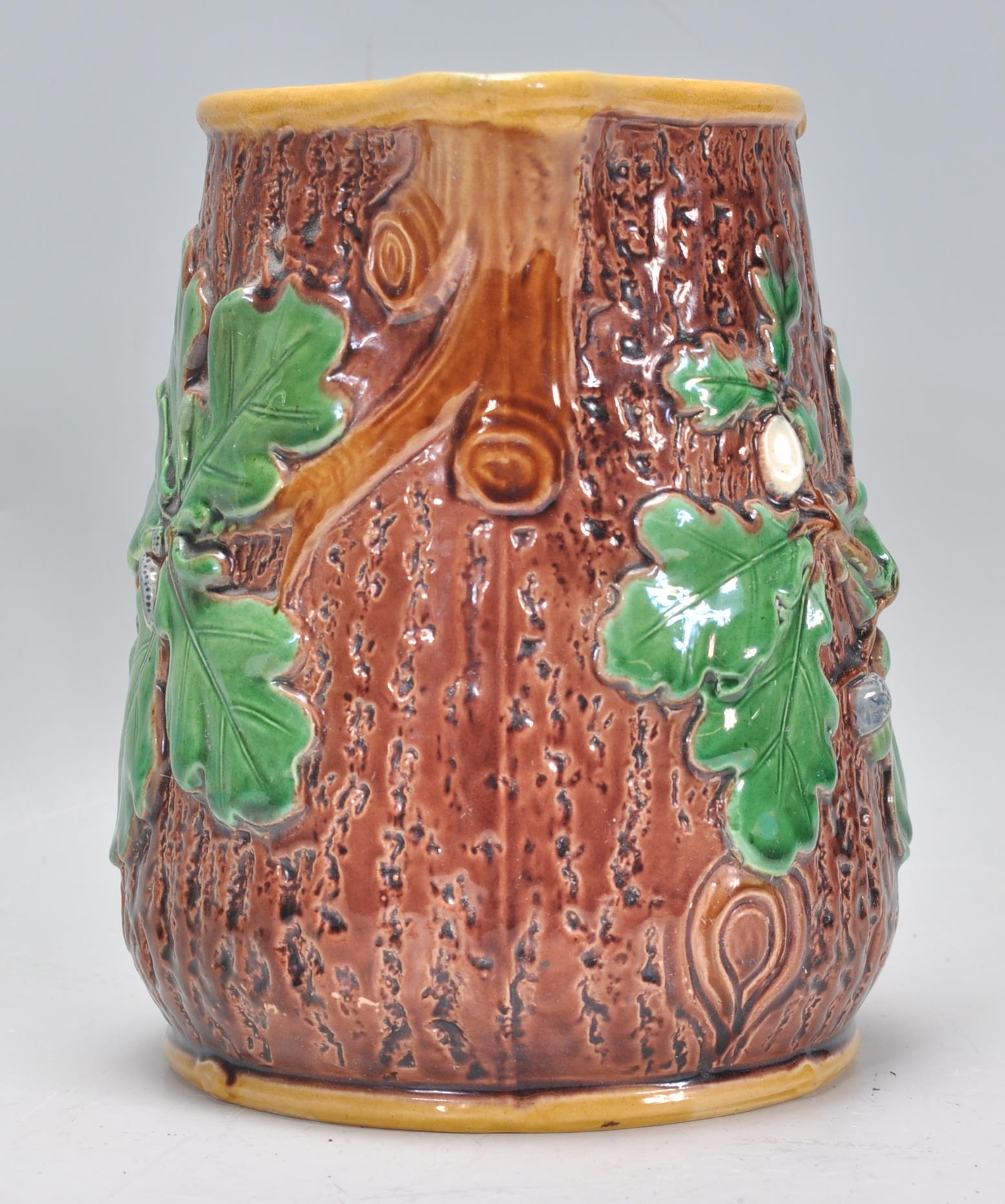 A 19th Century Victorian Mintons Majolica oak jug having a tree bark effect to the exterior with - Image 2 of 6