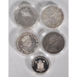 A group of five silver proof coins to include a 2014 silver dollar, a 1947-72 Elizabeth and Philip