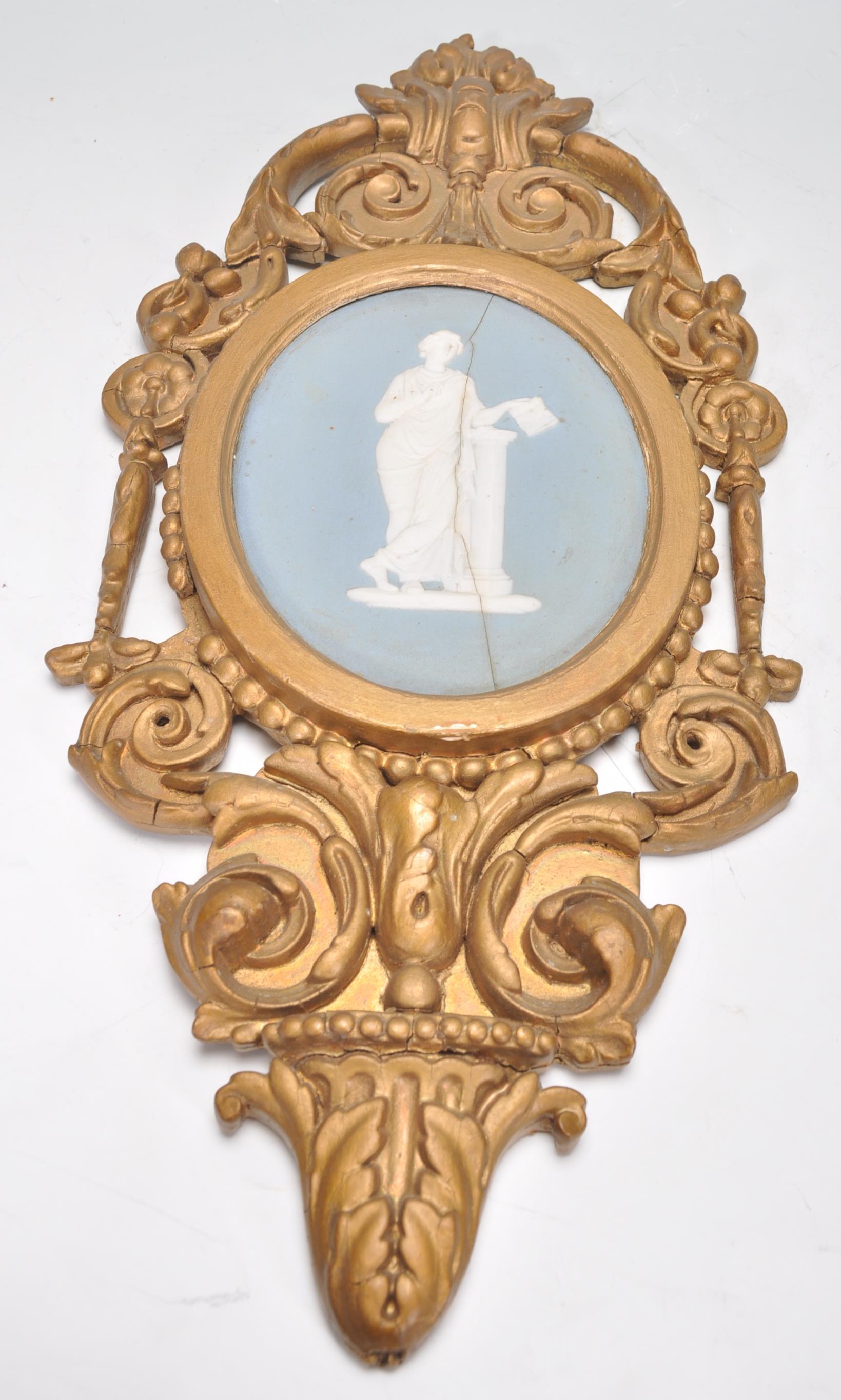 A pair of 19th century Wedgwood cameo plaques inset with classical scholars to each on oval blue - Image 4 of 7