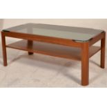 A retro 1970's teak wood coffee - occasional table by Myers having inset smoked glass table top