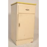 A retro mid century, circa 1950's formica two tone colourway pedestal cabinet. The upright white