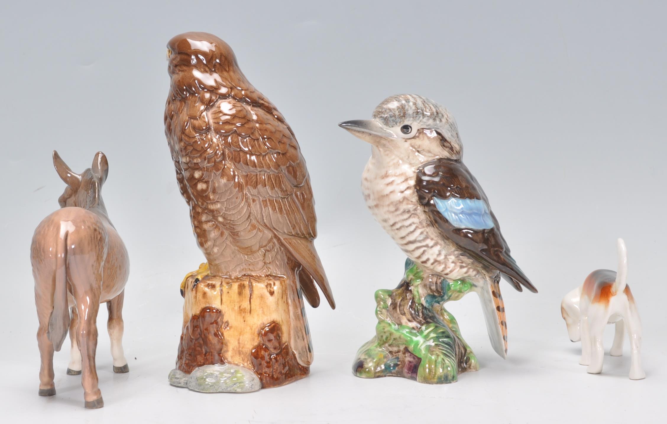 A collection of Beswick porcelain figurines to include a Cuckoo, hound, donkey and an Eagle being - Image 4 of 7