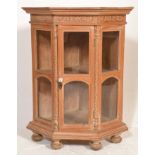 A 20th century Chinese republic period revival contemporary hardwood bijouterie corner cabinet