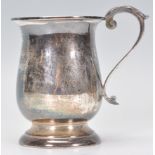 A mid 20th Century silver hallmarked christening cup of typical form having a acanthus leaf