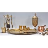 A large collection of vintage brass wares to include large oval tray, companion set, Indian brass