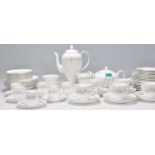 A vintage 20th Century Wedgwood Westbury pattern dinner service having a white ground with green
