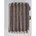 An English hallmarked cigar torpedo cigarette / cheroot case of reeded shaped form having engraved