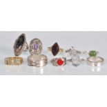 A selection of silver ladies dress rings to include an Art Deco style panel ring set with marcasites