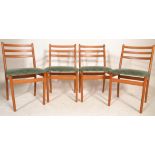A set of four vintage retro dining chairs having beechwood frames with three bars to the backs, on