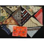 A group of ten vintage silk scarves to include DKNY, Aquascutum, Pastotimes, Echantal etc. In a wide