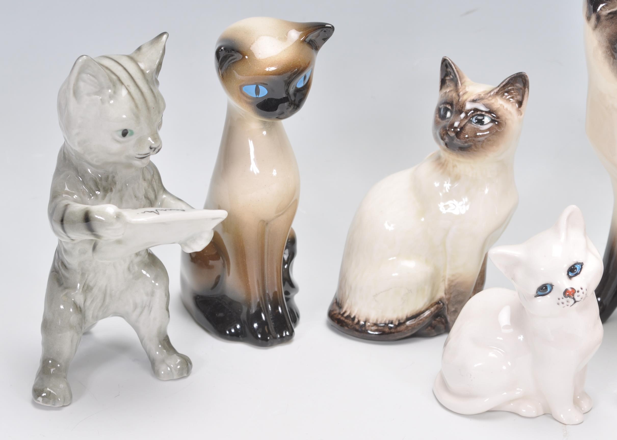 A group vintage 20th Century Beswick ceramic cats to include Siamese cat examples, Persian cats etc. - Image 2 of 11