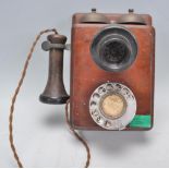 A vintage GPO  TE30 234 N2121 early 20th century telephone with mahogany box earpiece on cord with