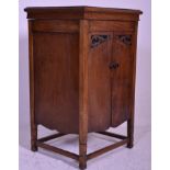 An early 20th Century oak cased Edwardian upright