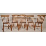 A set of 5 19th century Victorian beech and elm wood windsor dining chairs. Raised on turned legs