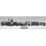 A group of vintage film cameras to include an Ilford Sportsman, a 56 X Instamatic camera, a Comet