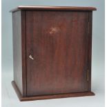 A 20th Century mahogany fifteen drawer coin collectors cabinet, the outer case opening to reveal