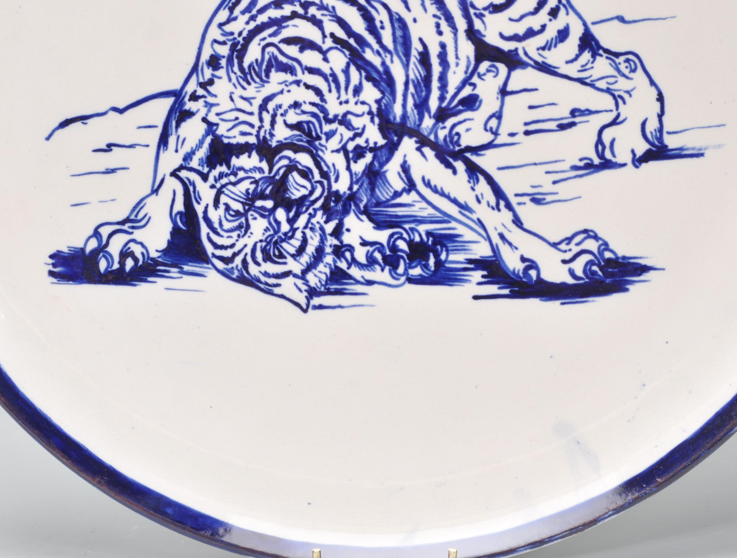 A large early 20th Century English blue and white charger plate in the manor of Frederick Rhead - Image 4 of 9