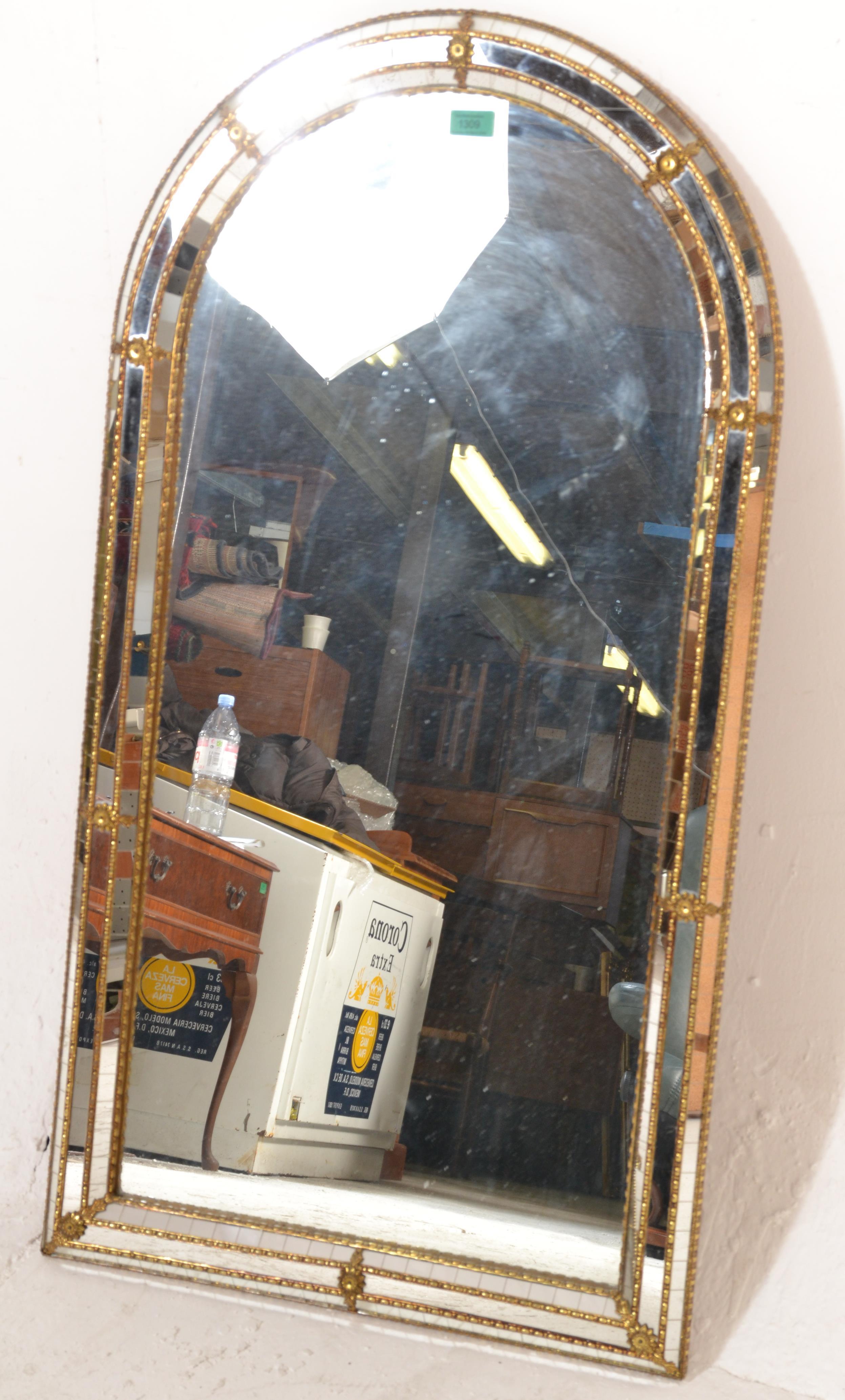 A 20th century Venetian gilt mirror of arched form with cushion border adorned qwith multiple mirror - Image 7 of 7