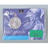 A Royal Mint Britannia 2015 finesilver fifty pound coin in its original packaging.
