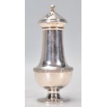 A hallmarked sterling silver sugar castor sifter. Makers mark Duncan and Scobbie and dated 1928,