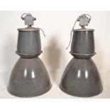 A set of 2 mid century Industrial black enamelled painted cylindrical factory pendant shades of