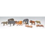 A good group of early 20th Century handmade wooden animals, each with hand painted detailing and