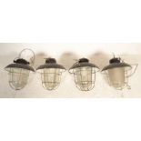 A set of 4 Industrial factory pendant cage lamps - lights. Each with space age metal tops with