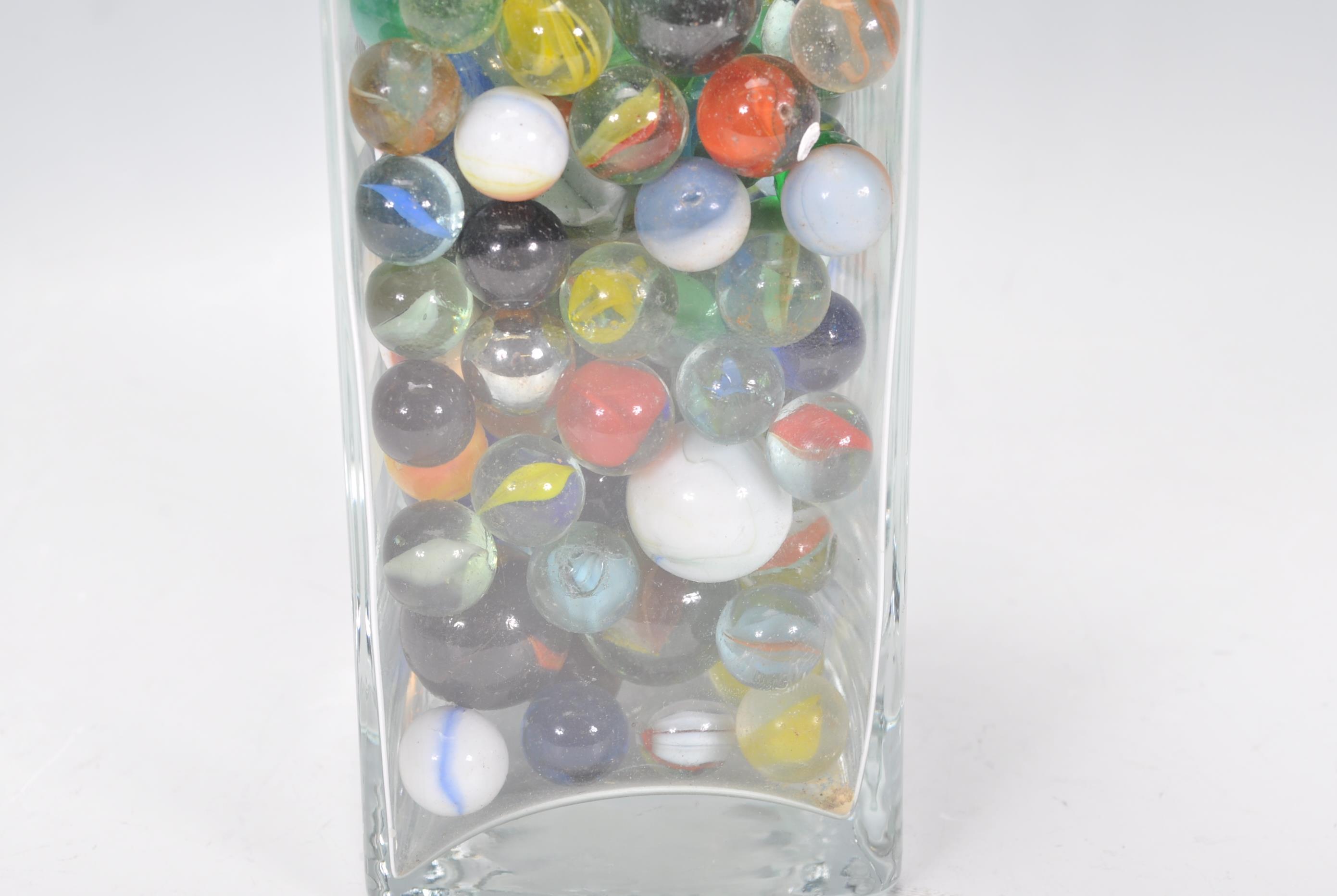 A collection of marbles to include glass cats eye marbles, some white and coloured glass examples, - Image 6 of 11