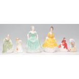 A mixed collection of ceramic figurines to include three Royal Doulton ladies one Emma HN 3208,