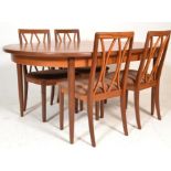 A 1960's mid 20th Century G Plan Fresco range teak wood extendable dining table having an oval top