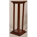 A 19th century Victorian mahogany bust / plant stand. Raised on squared column supports having