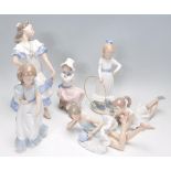 A group of Nao porcelain figurines to include a large flamenco dancer, two ballerinas, 'My dog