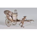 A Chinese early 20th century silver plated cruet set in the form of a rickshaw being pulled by a