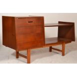 A retro mid 20th Century teak wood side unit / TV unit having a full front cupboard to the left with