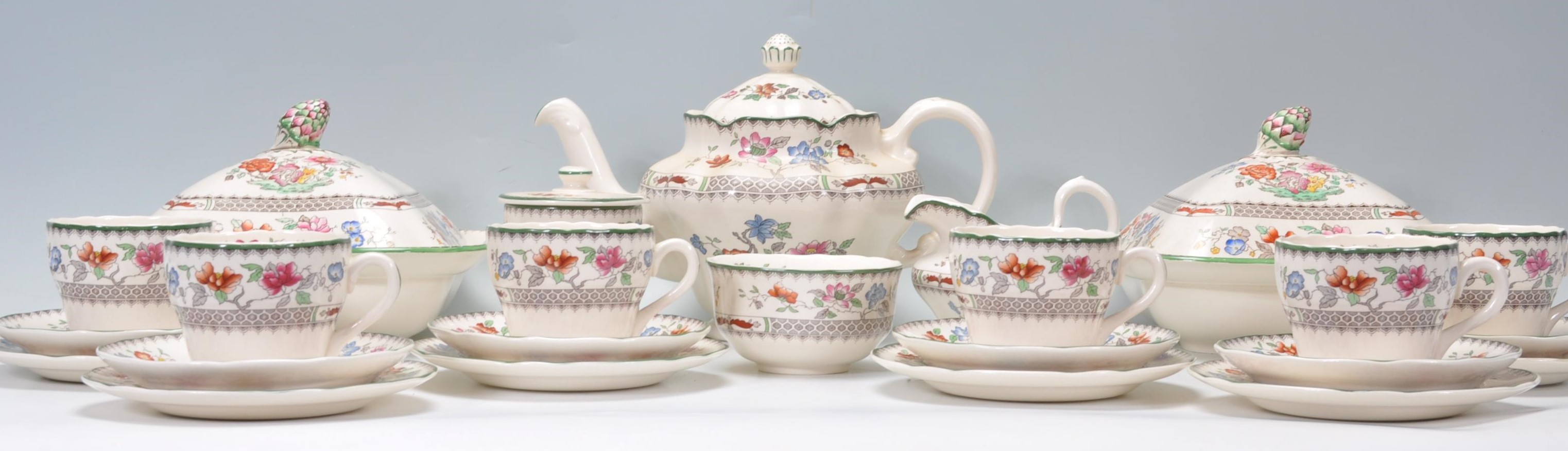 A vintage Spode Chinese Rose pattern six person tea service to include a teapot, sugar bowl, jam