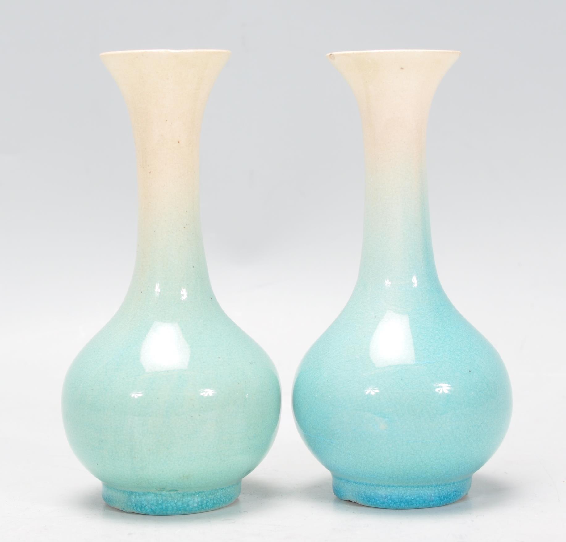 A pair of Japanese porcelain bottle vases vases with tapering cylindrical necks with flared necks - Image 2 of 6