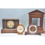 A mixed group of clocks dating from the early 20th Century to include an Art Deco Metamec Dereham
