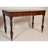 A Victorian 19th century mahogany two drawer large writing table desk. Raised on turned legs
