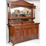 A late 19th century very good quality walnut mirror back sideboard in the Arts & Crafts manner