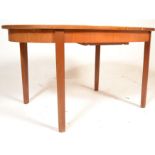 A retro teak wood mid century William Lawrence Danish inspired dining table and chairs. The table