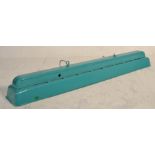 A large metal industrial factory 20th century turquoise colourway rectangular strip light shade