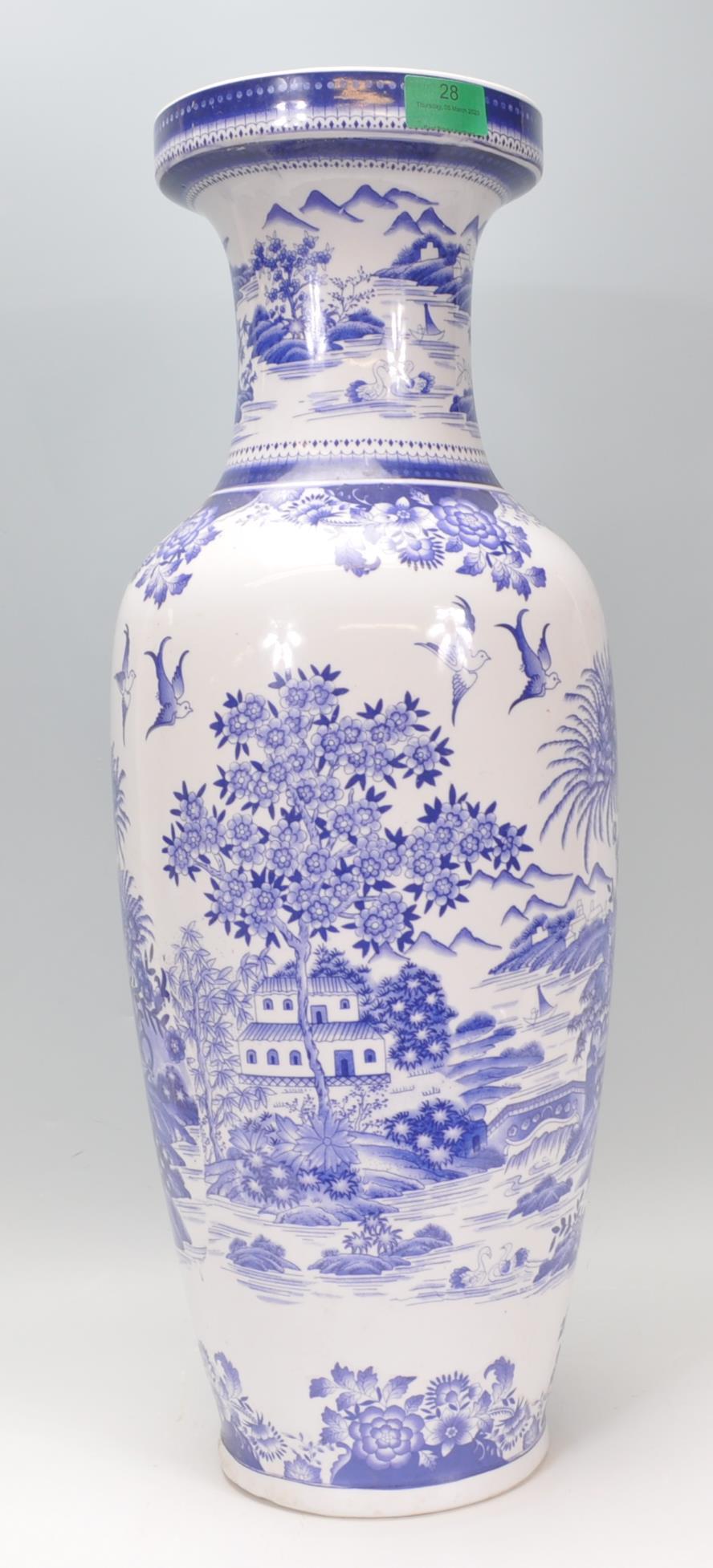 A large 20th century Chinese floor standing blue and white vase depicting fauna and birds with a - Image 4 of 6