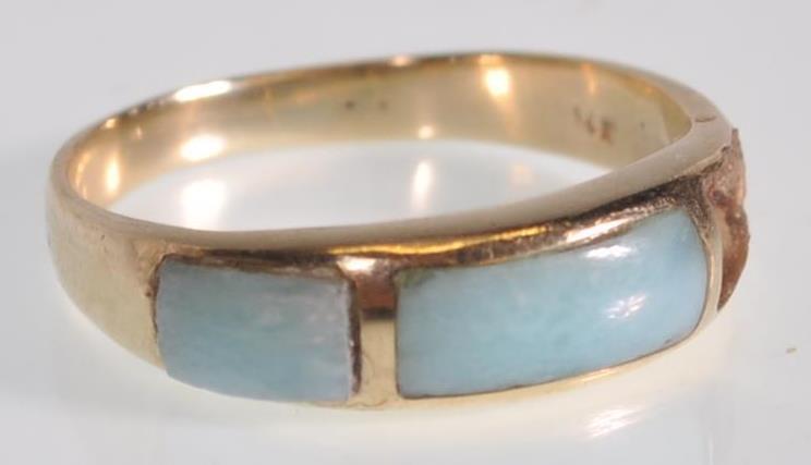 A stamped 14ct gold ring set with blue stone panels to the head. Weight 2.2g. Size N. Please note - Image 2 of 6