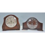 Two early 20th Century mantel clocks. One of oak domed construction having Arabic numeral chapter