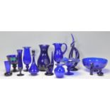 A large collection of Bristol Blue glass to include bowl, goblets, vases and other items of