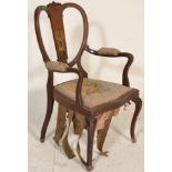A 19th century mahogany and marquetry inlaid armchair. Raised on cabriole legs with tapestry seat