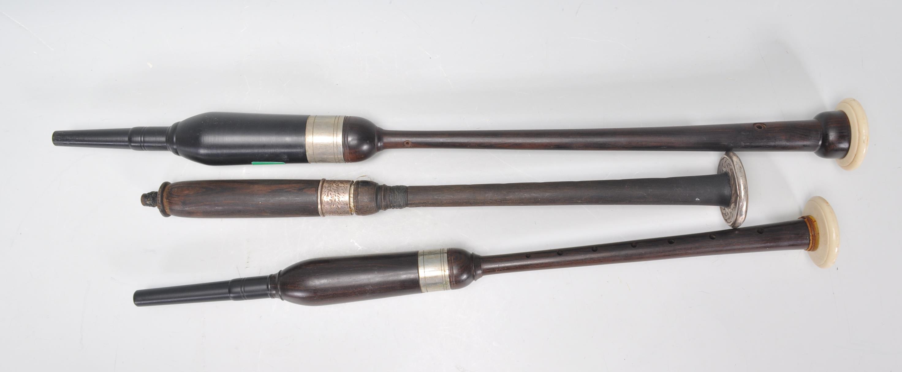 A collection of bag pipe pipes dating to the 20th century in varying lengths  to include white metal - Image 2 of 8