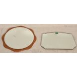 A retro 20th Century teak framed wall mirror of round form having a shaped teak frame. Together with